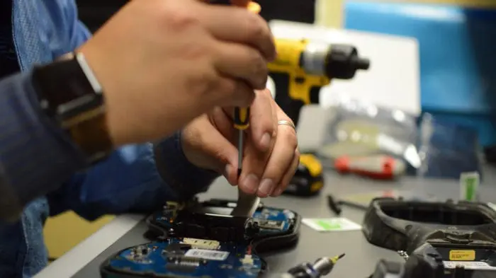 Service technician fixing item